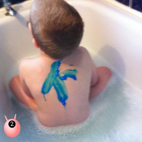 Bath time fun crazy soap blue paint drawn to make a letter k on back