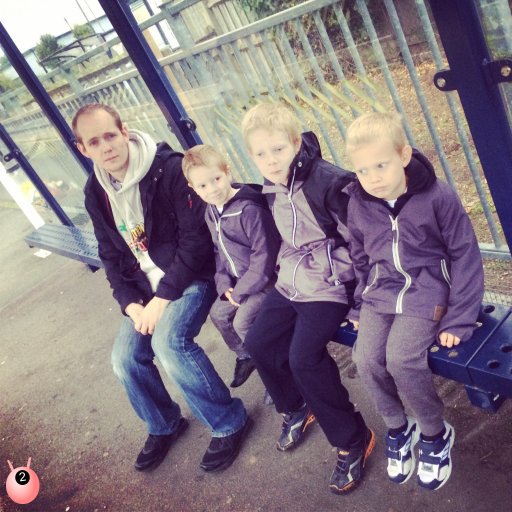 4 males waiting for a train