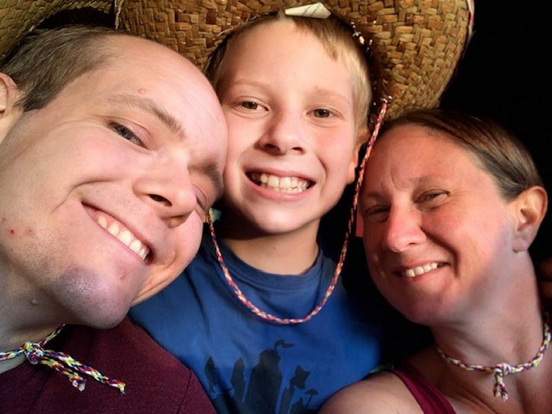 Happy boy with parents at Chiquotos