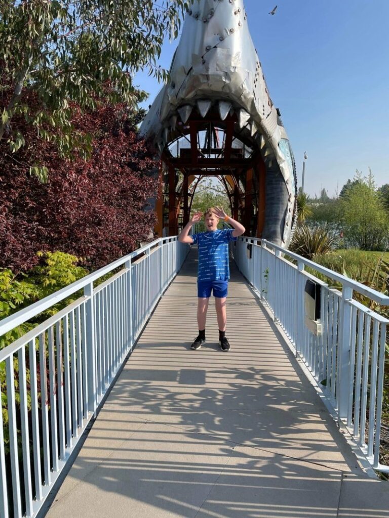 the sensory seeker teen outside Shark Hotel at Thorpe Park